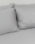 100% TENCEL fitted bedsheet set in a stylish arrangement.