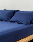100% TENCEL fitted bedsheet set with elegant draping.